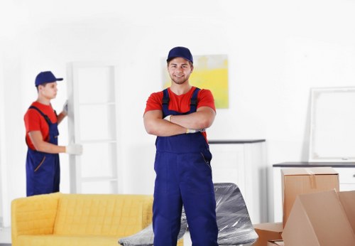 Highbury Removals team packing and handling household items