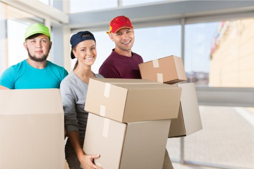 Moving boxes and furniture prepared for a Highbury relocation