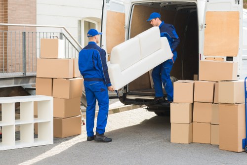 Man with van removal service near Highbury residential street
