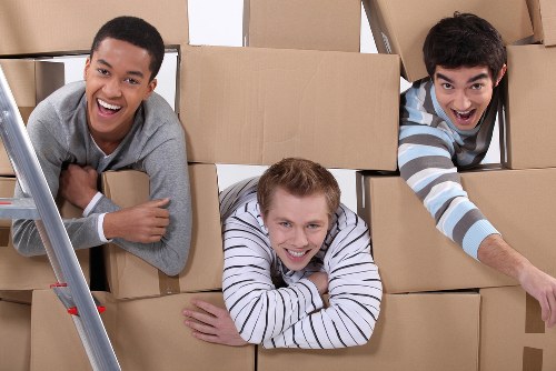 Loading furniture and boxes into a removal van in Highbury