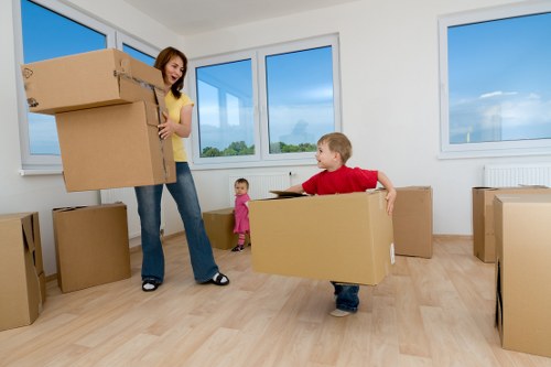 Packed boxes and furniture ready for transport in Highbury