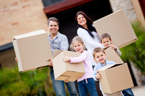 Unpacking services arranging furniture in a new home